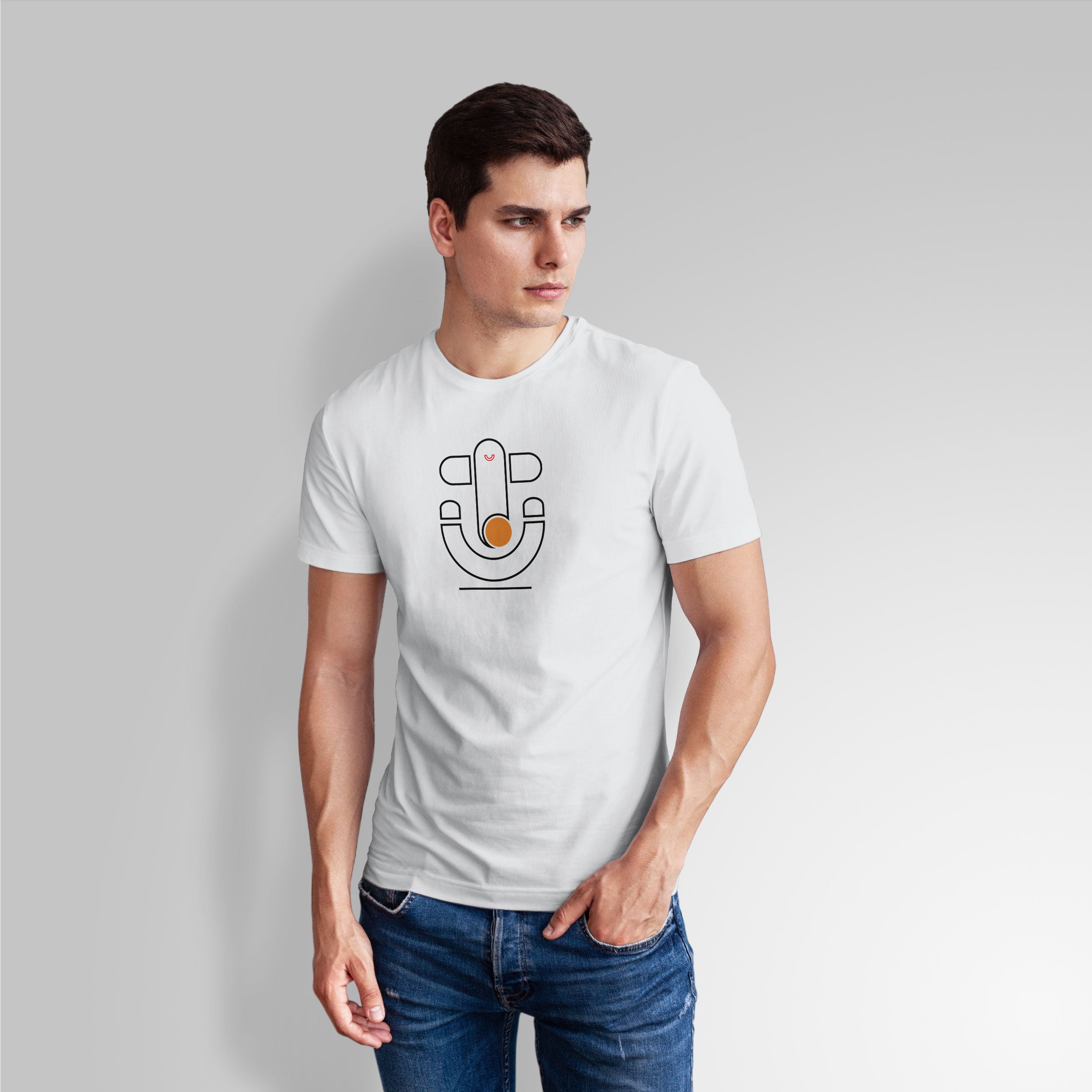 Man wearing a white t-shirt with a graphic design on a plain background