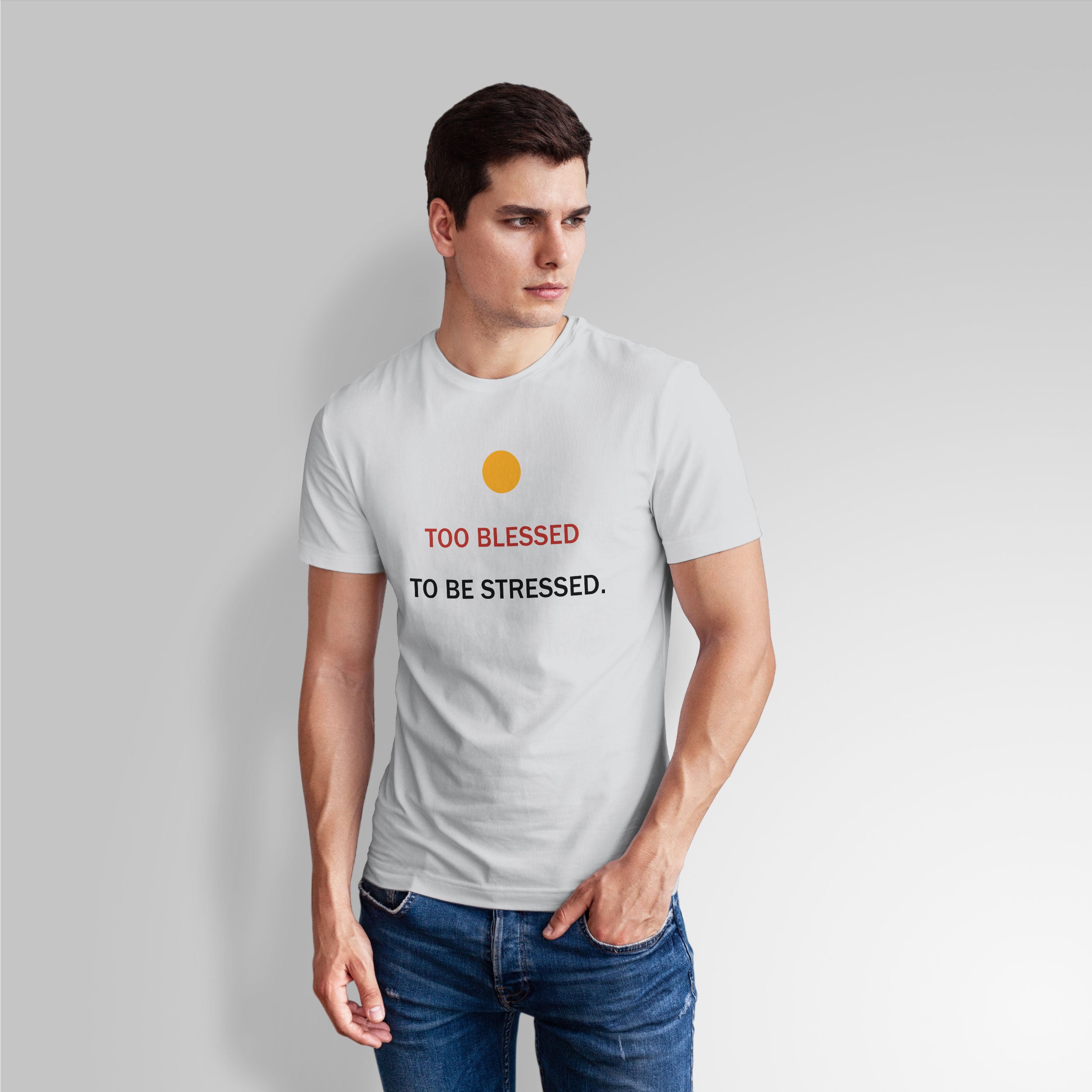 Man wearing a white t-shirt with a motivational quote on a plain background